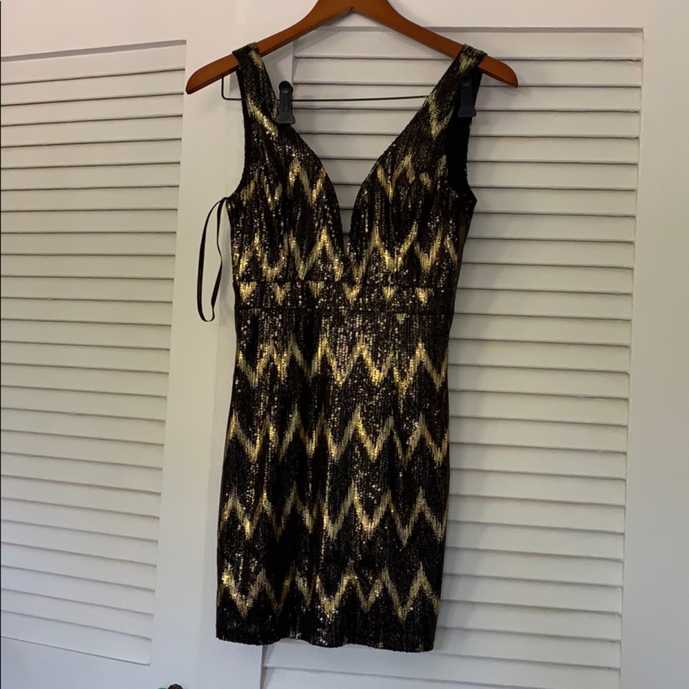 Black and gold sequin party dress by ark & co
